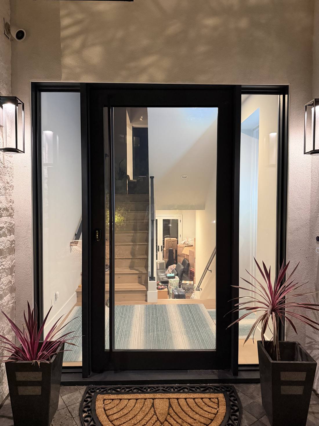 Glass front door with sidelights, smart film clear