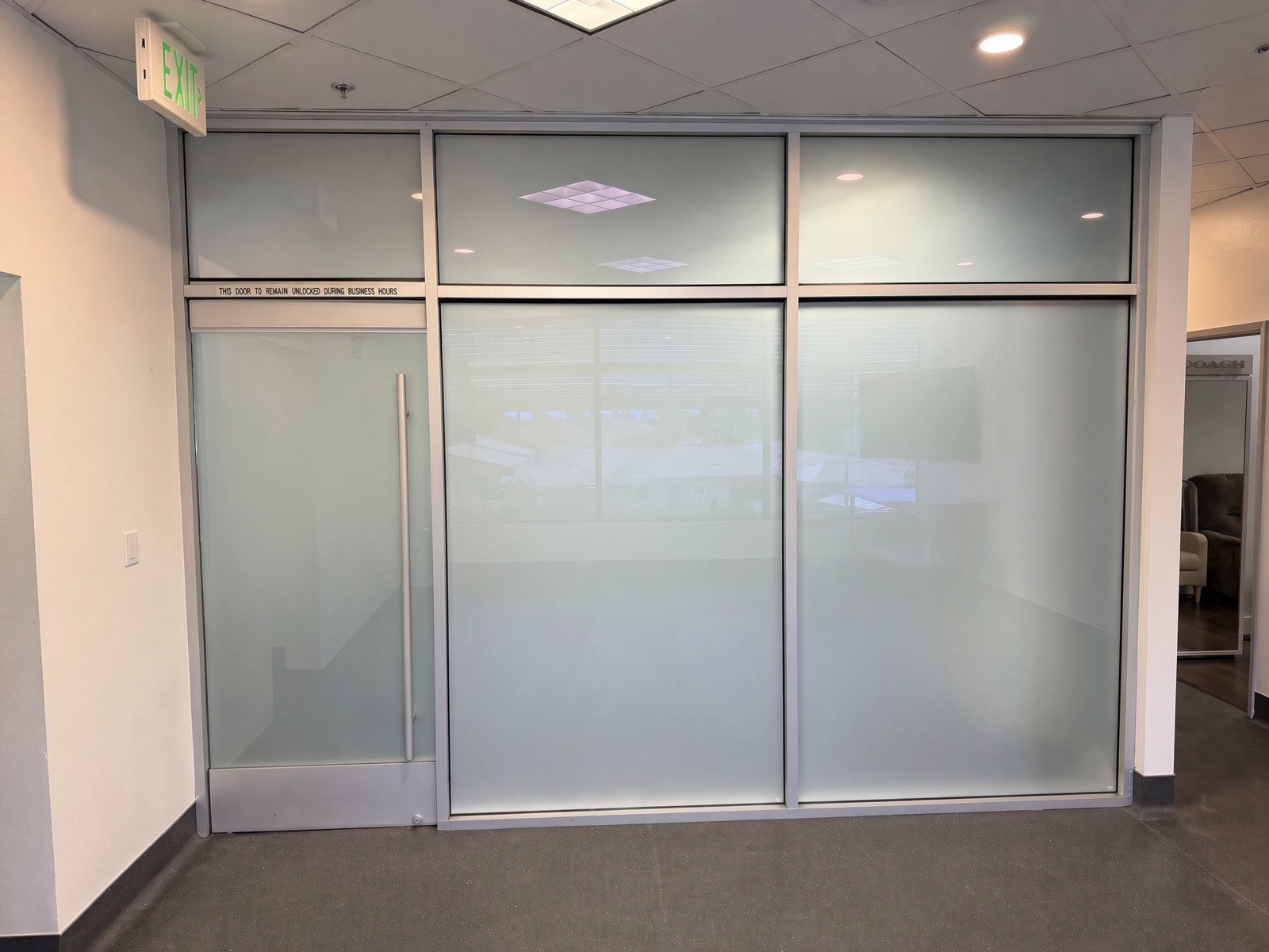 Medical office glass partition, smart film frosted for privacy