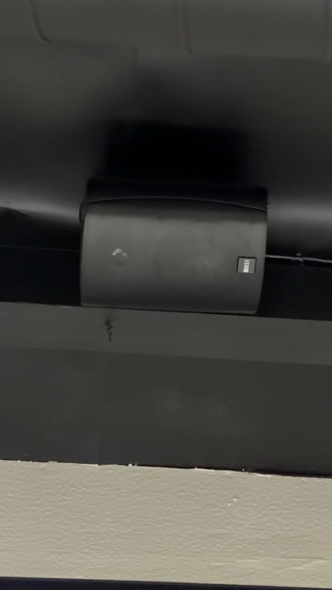 In-ceiling background music speaker installed