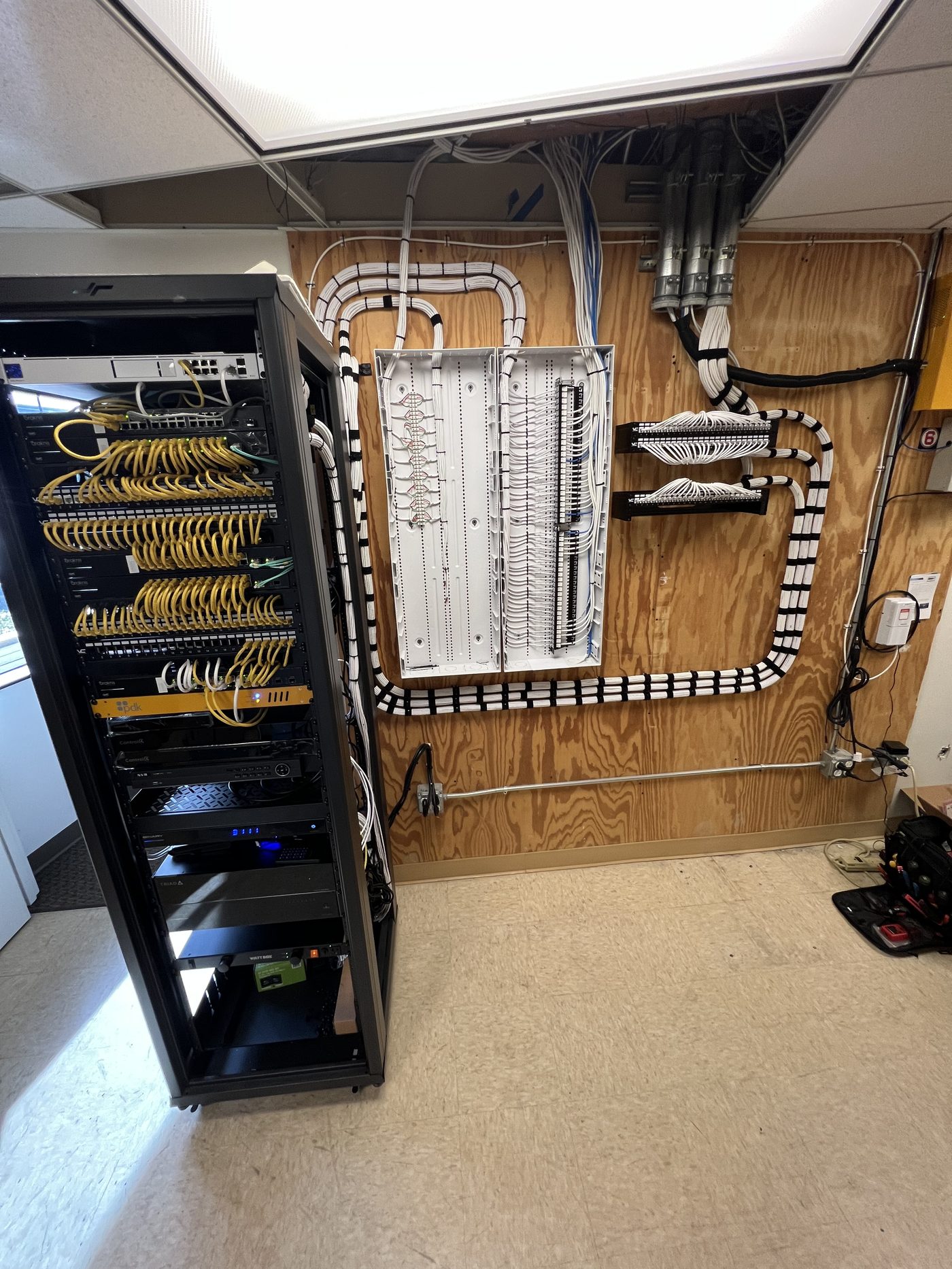 Server rack with network switches and structured cabling distribution panels