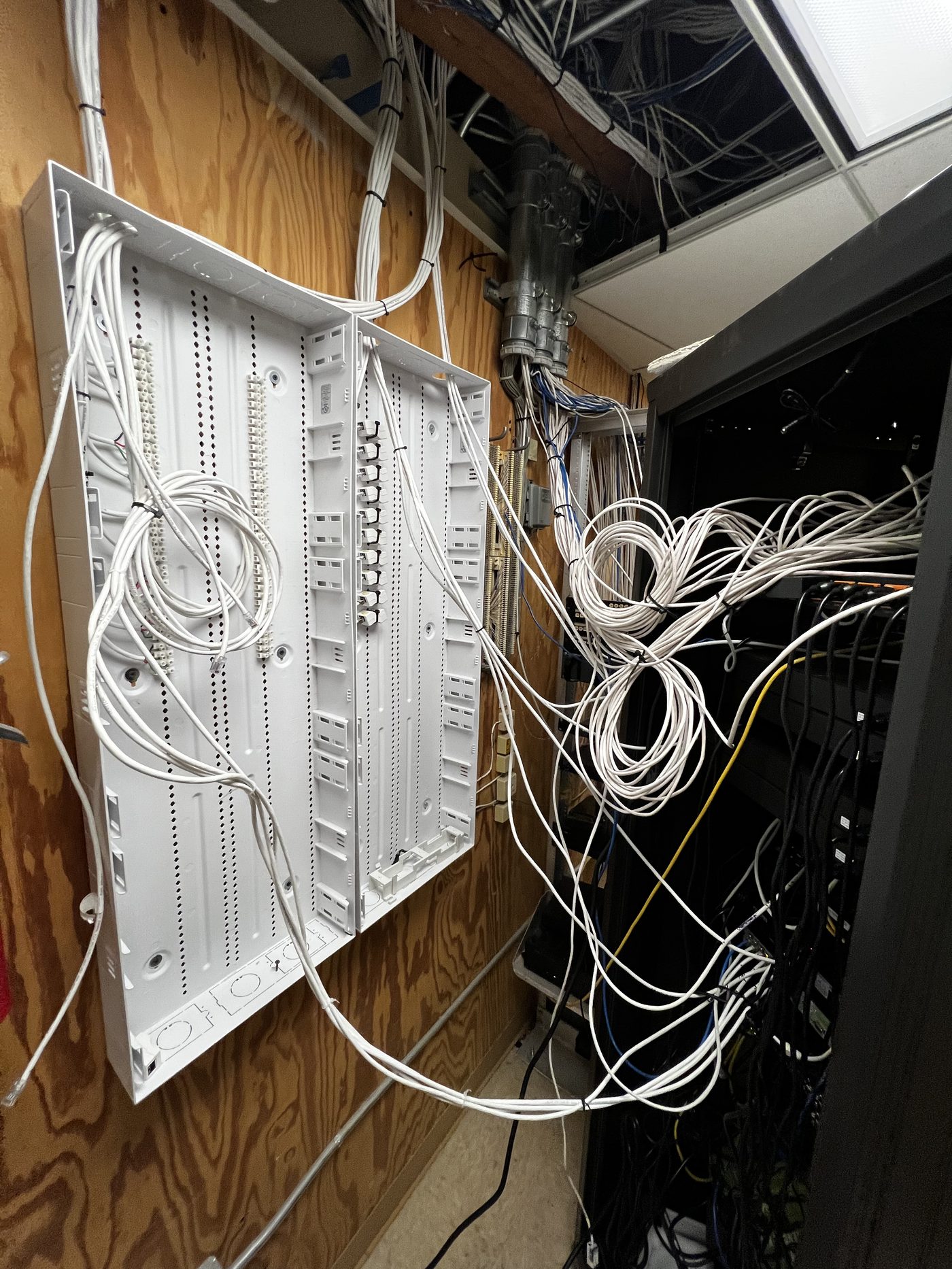 Punch-down blocks and cable bundles routed to server rack