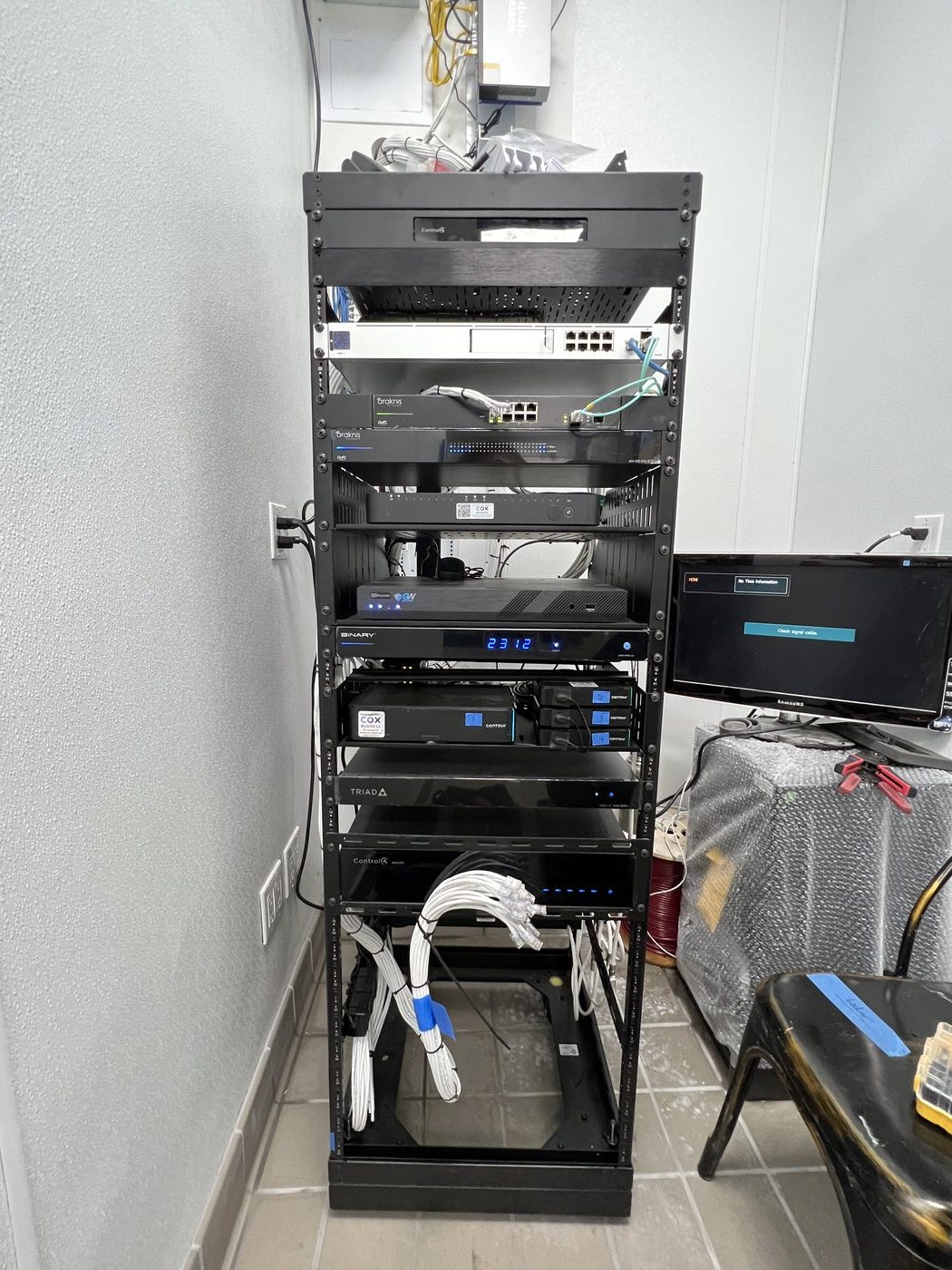 Equipment rack with Control4 automation and network switches