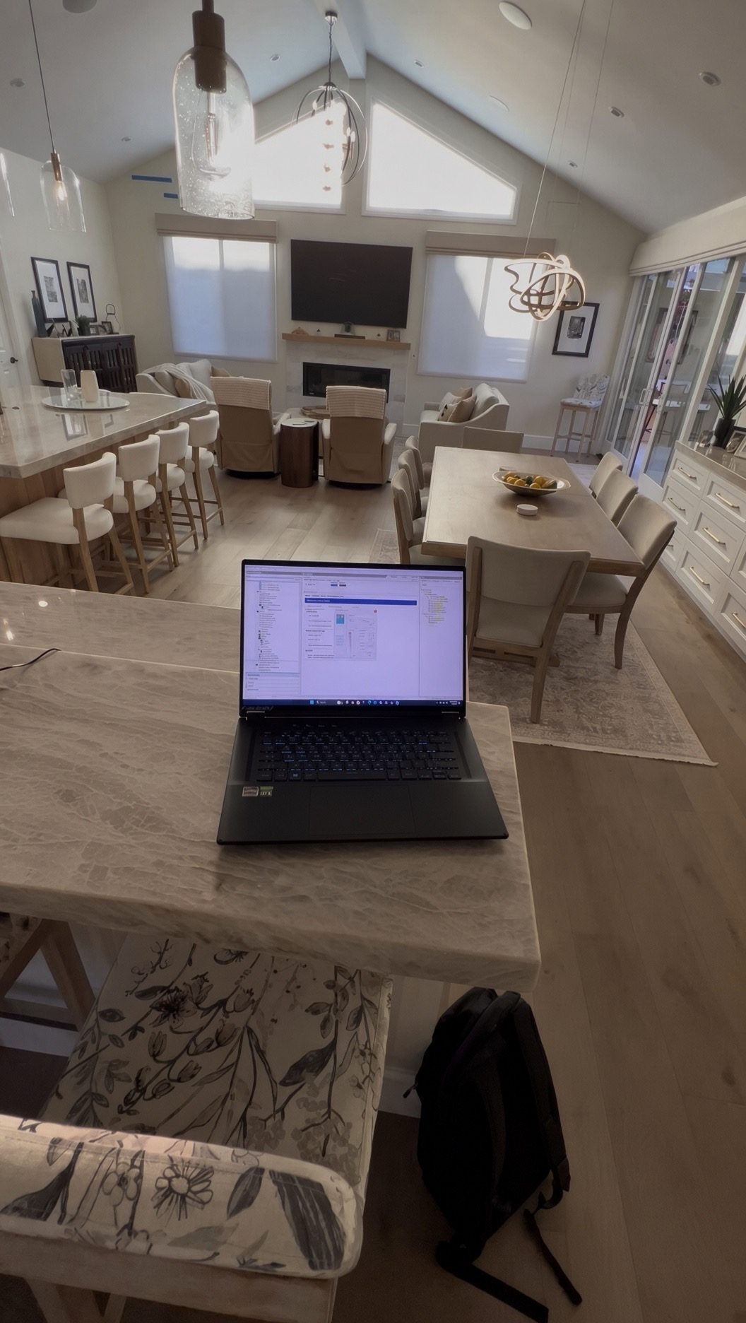 Open-concept living and dining area with network configuration in progress