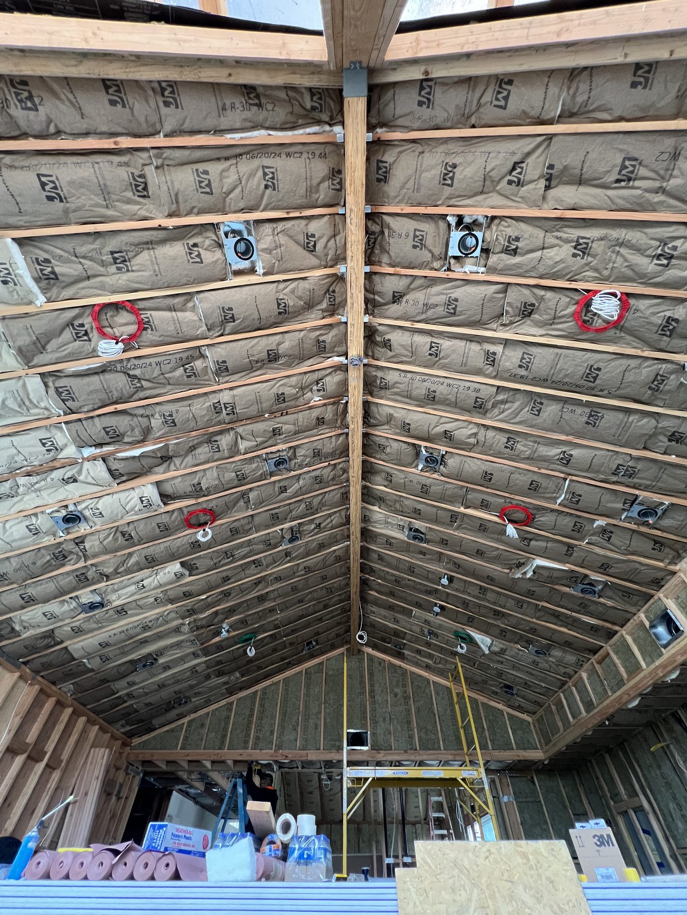 New construction roof framing with pre-wired speaker and camera locations