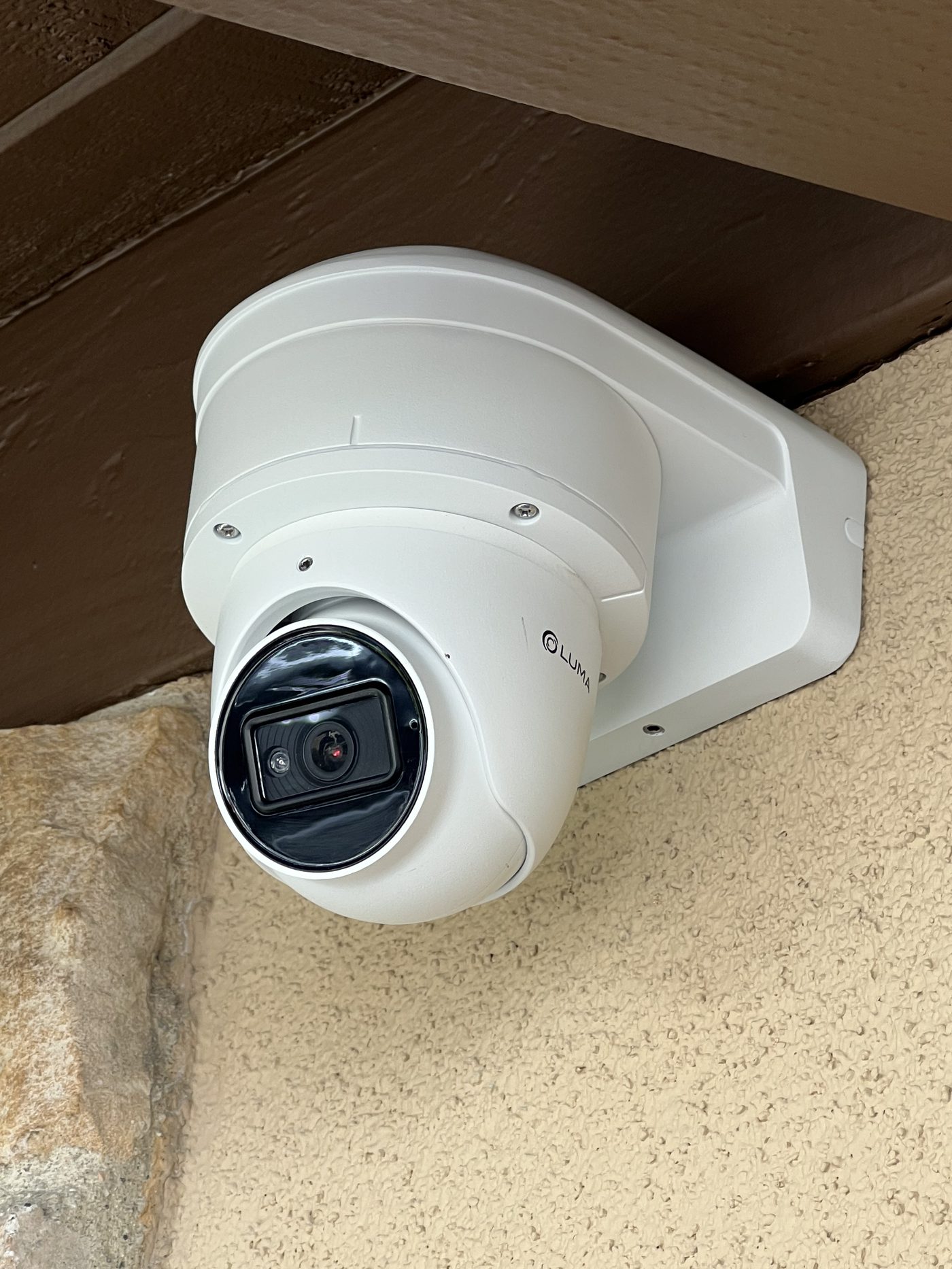 Outdoor security camera mounted under the eave