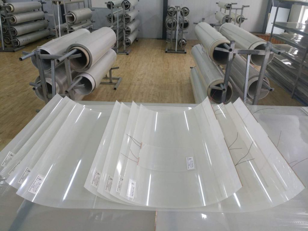 Rolls and cut sheets of PDLC smart film ready for installation